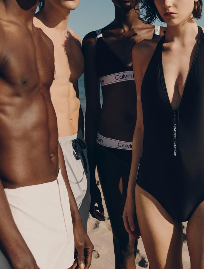 Close up of various men and women wearing swimwear