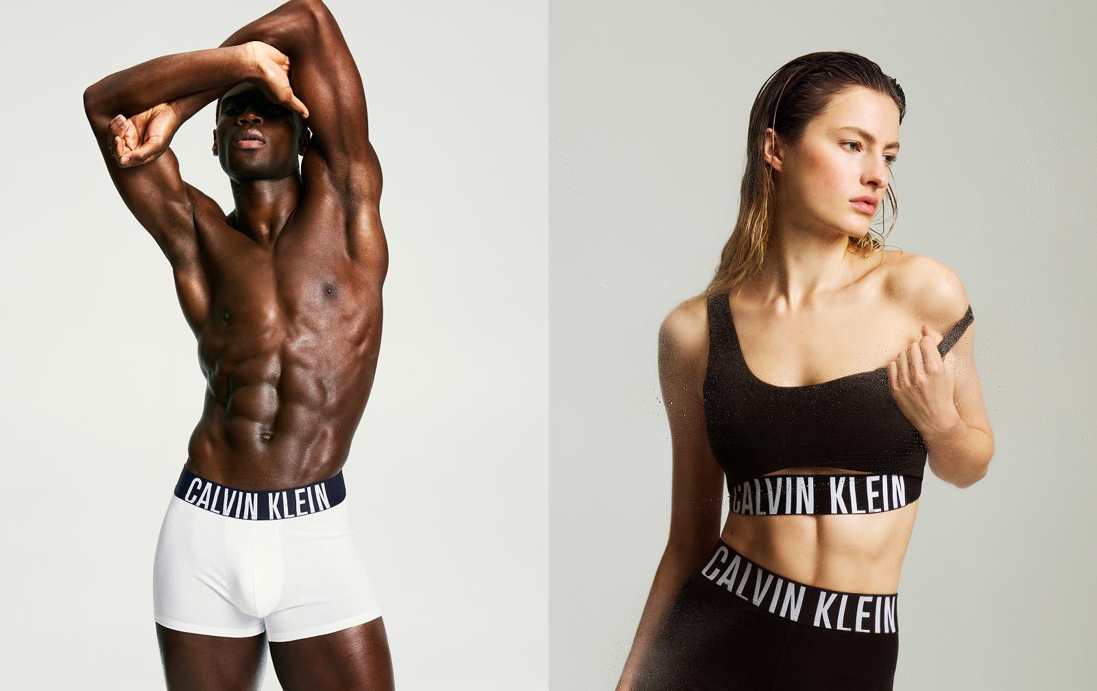 Male model posing in white Intense Power trunks, and female model posing in matching Intense Power activewear set in black.