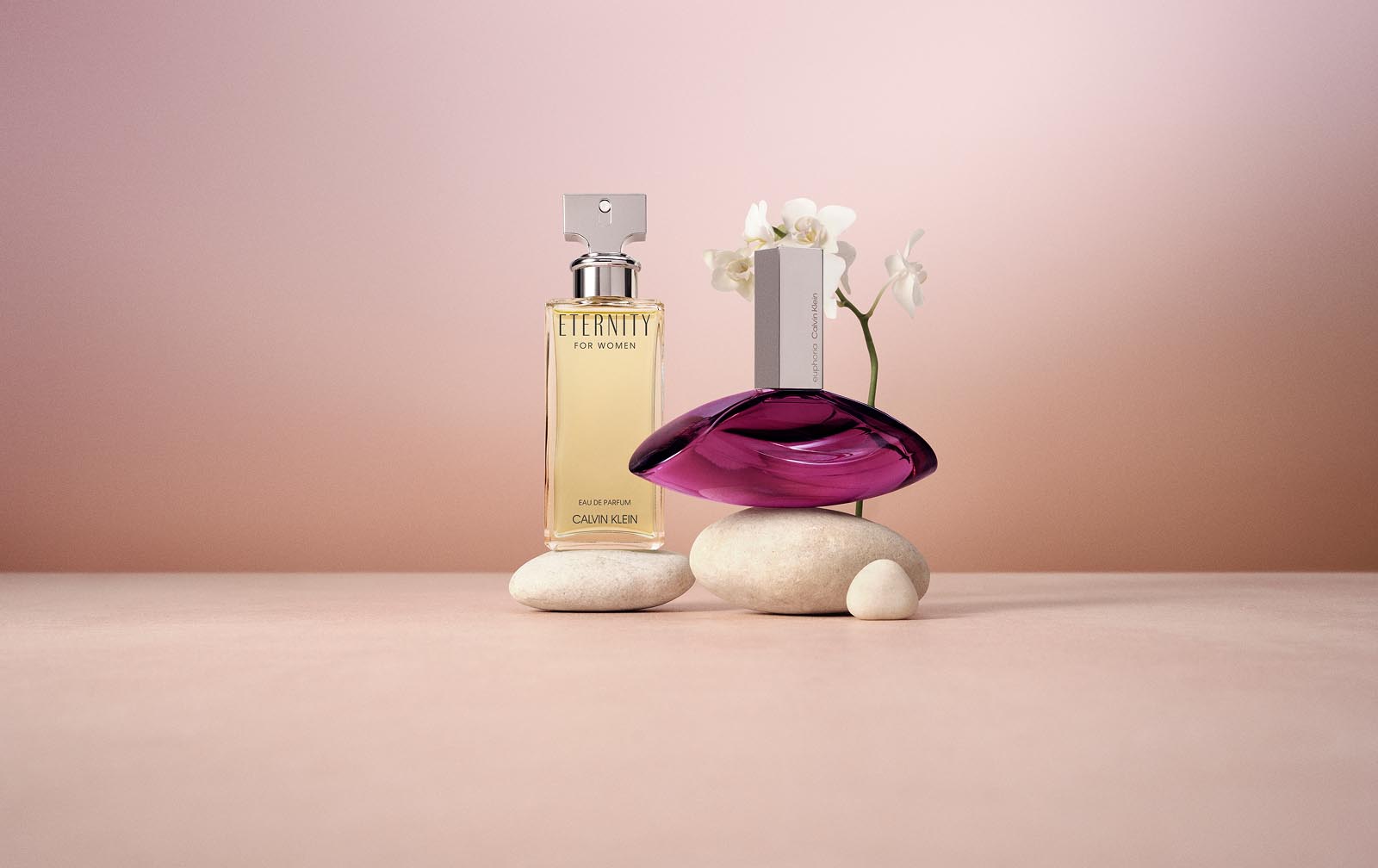Two bottles of Calvin Klein perfumes.