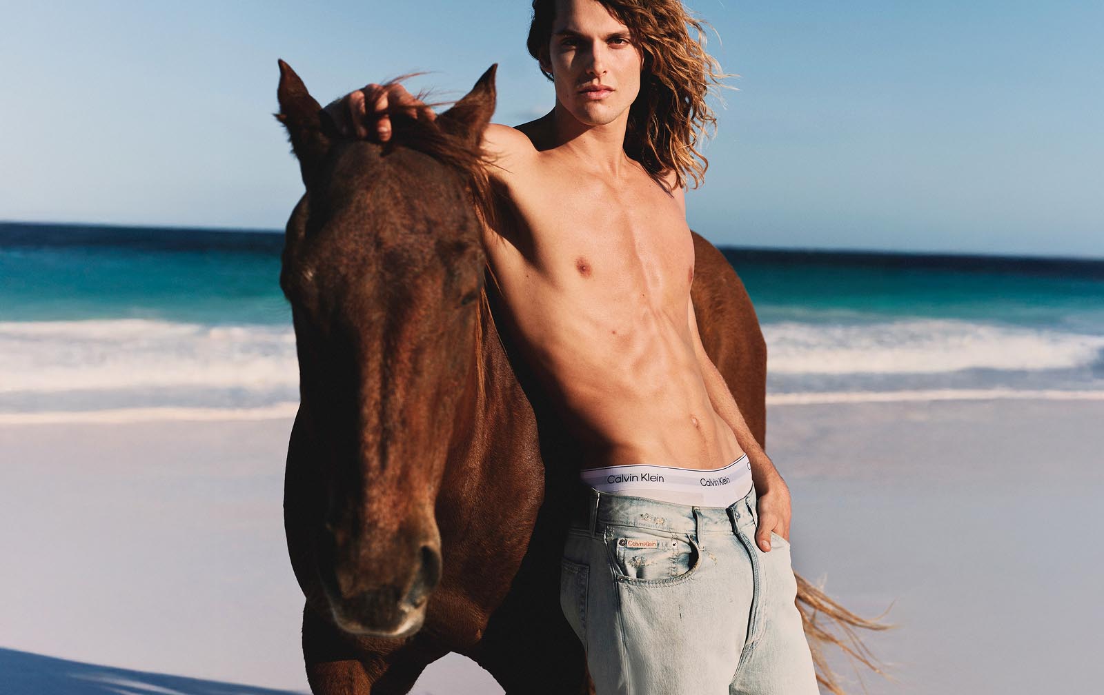 Model wearing Calving Klein jeans.