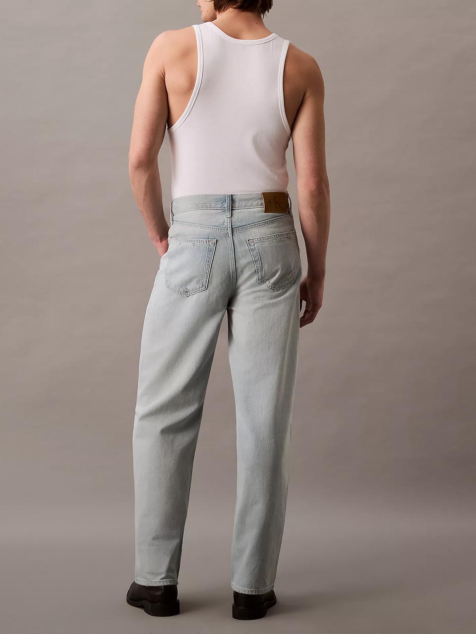Model wearing Calvin Klein Baggy jeans.