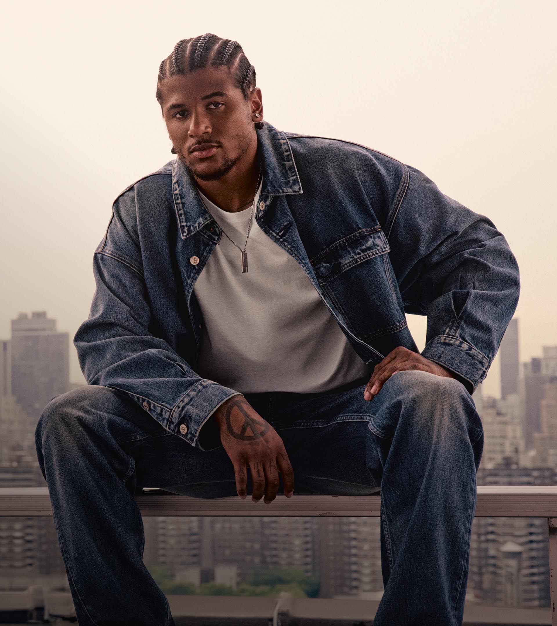 Jalen Green wearing a denim jacket with jean and a white t-shirt.