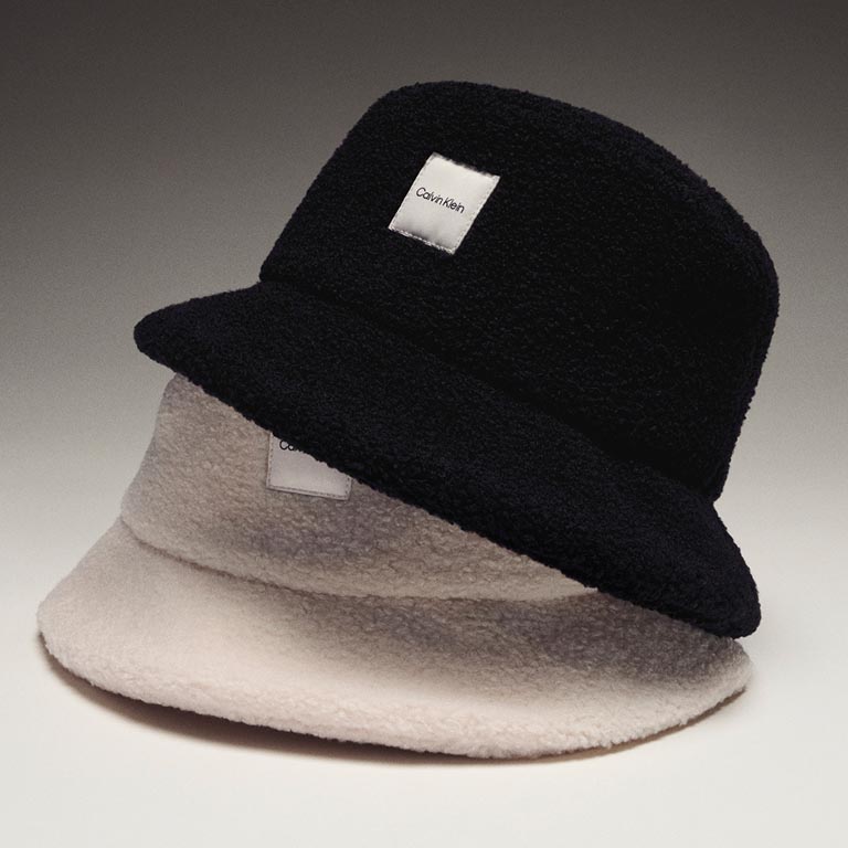 Still life image of stacked bucket hats