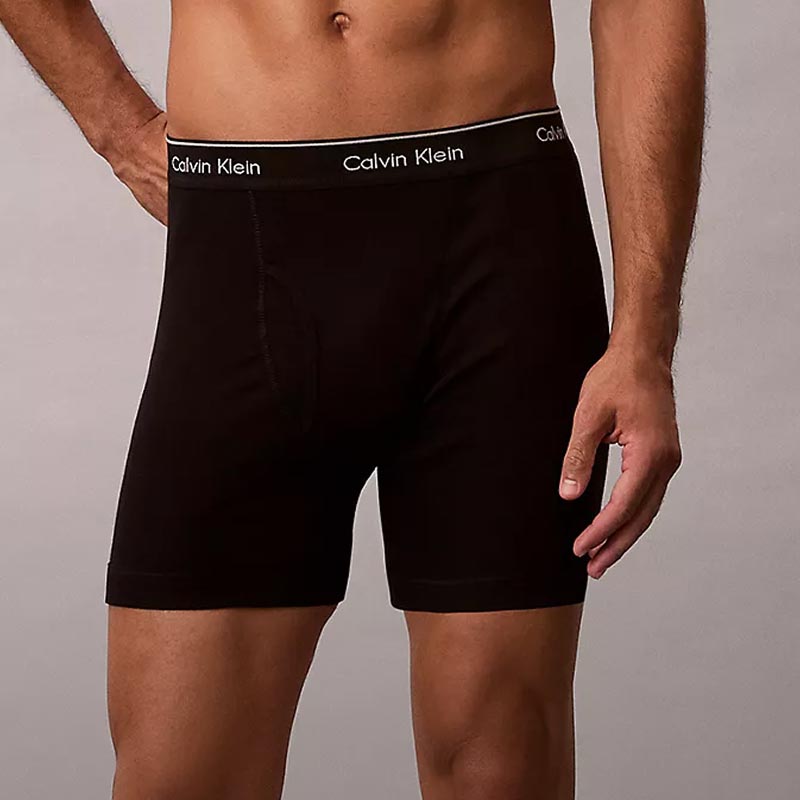 Model posing in black boxer brief underwear