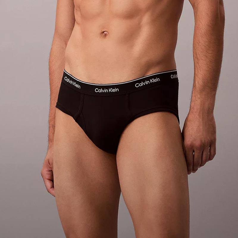 Model posing in black brief underwear