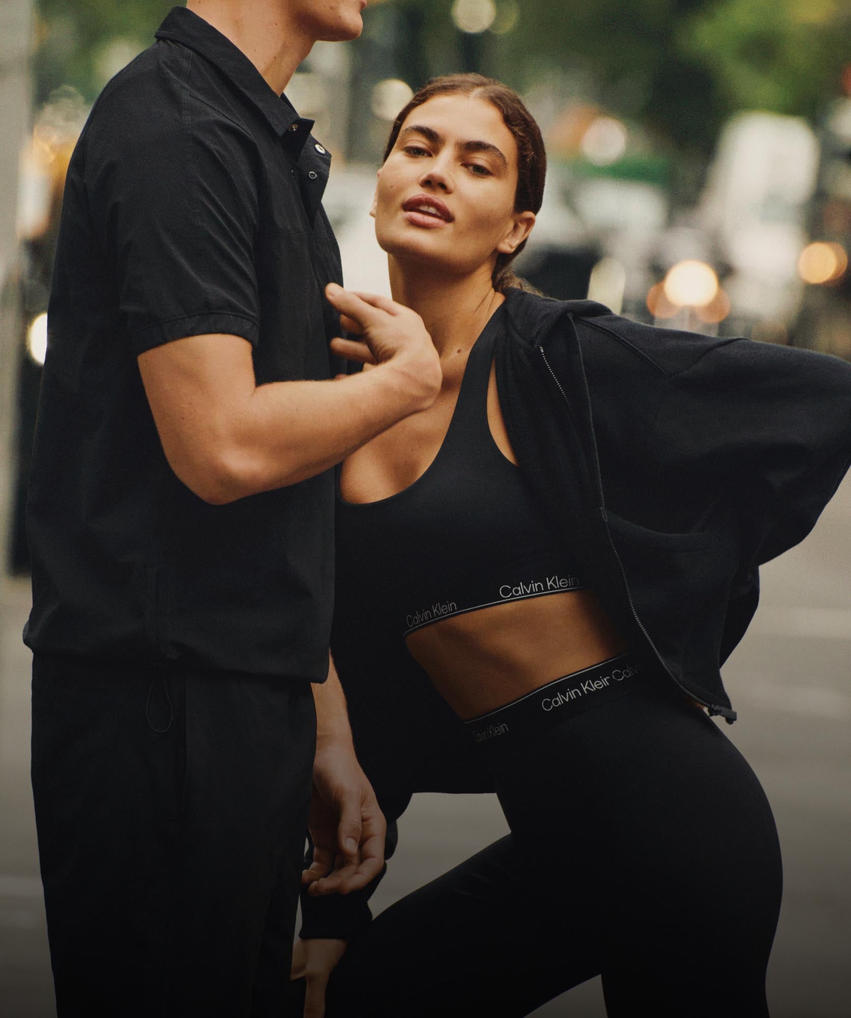 Models posing around the city wearing Calvin Klein activewear styles