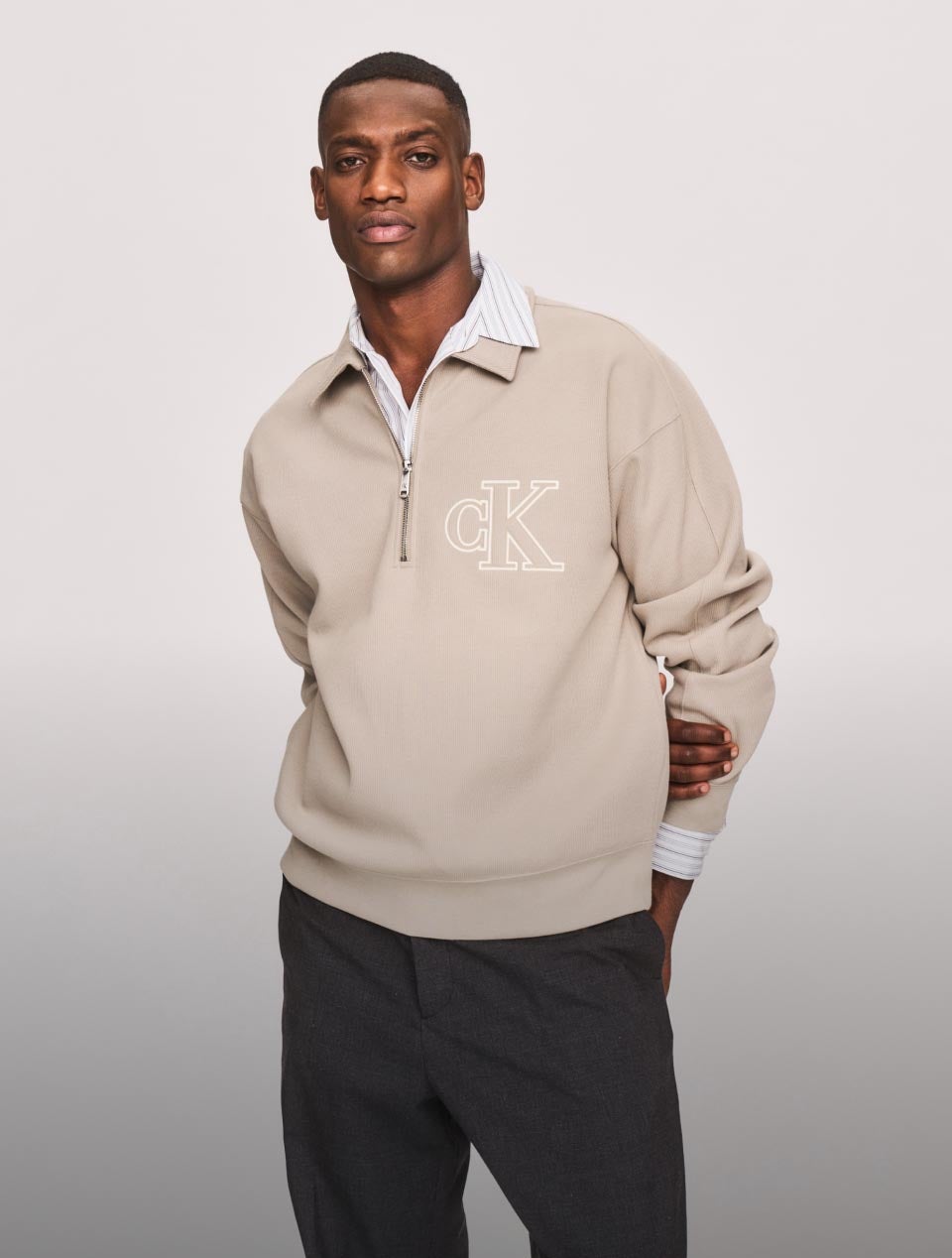 Models wearing apparel featuring the new Calvin Klein logo