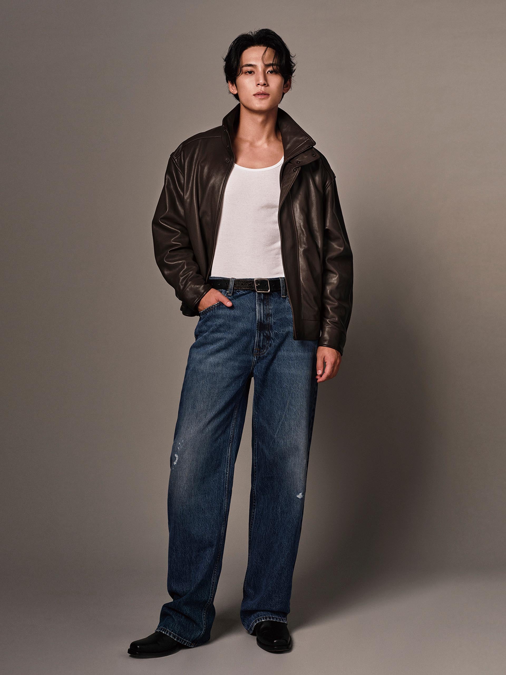 Mingyu wearing a leather jacket