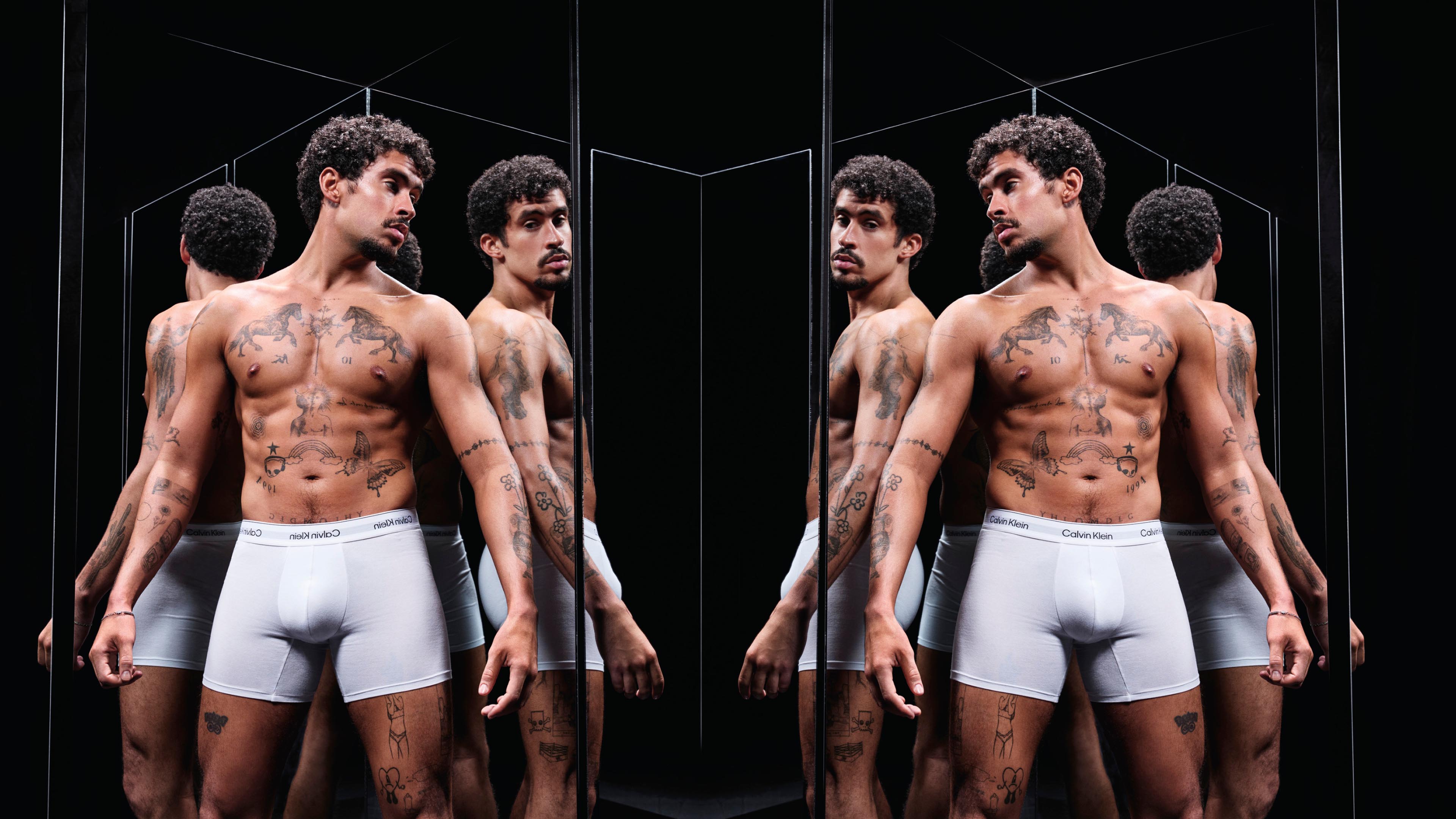 Bad Bunny posing in Calvin Klein Underwear