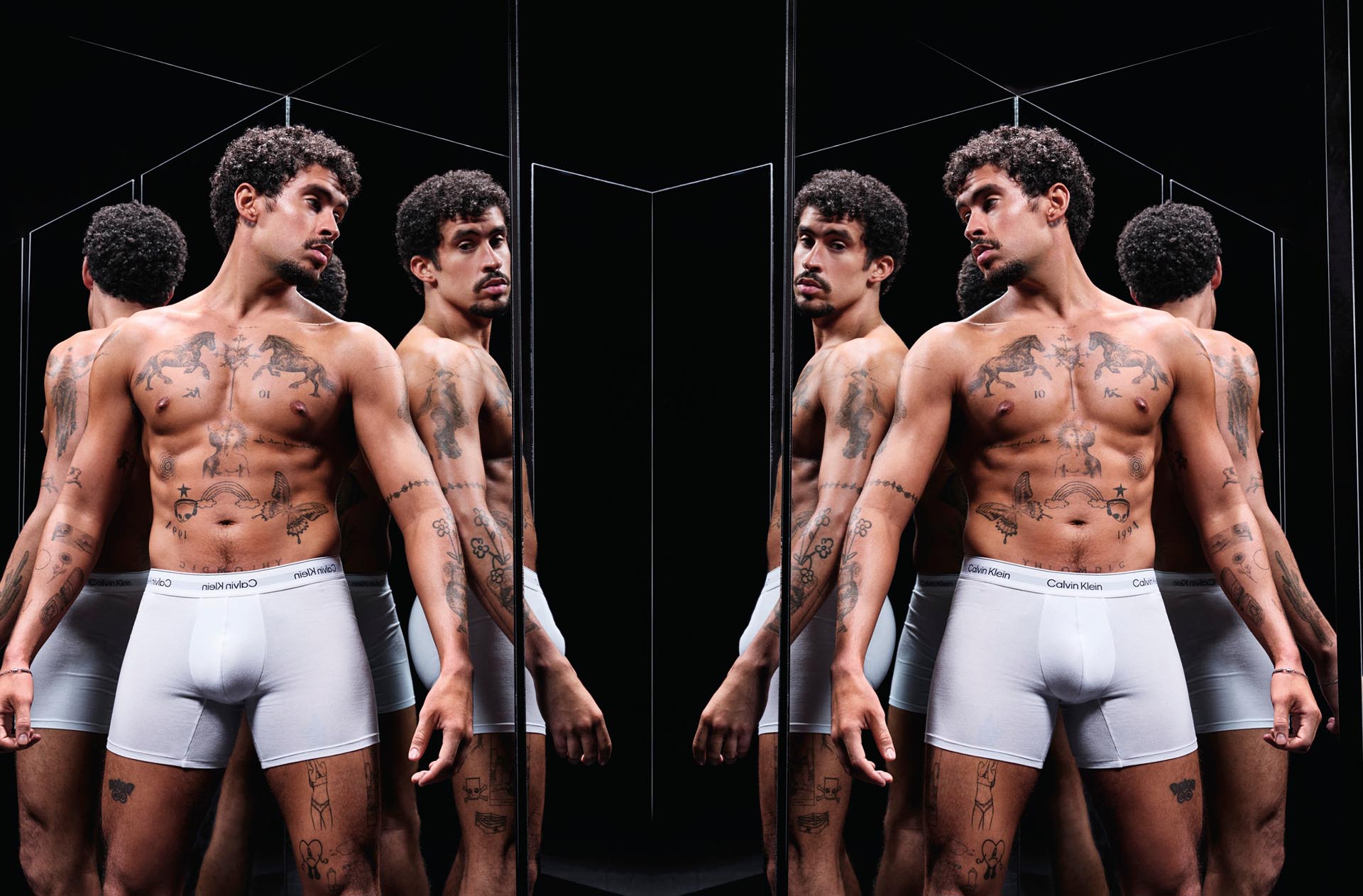 Bad Bunny posing in Calvin Klein Underwear