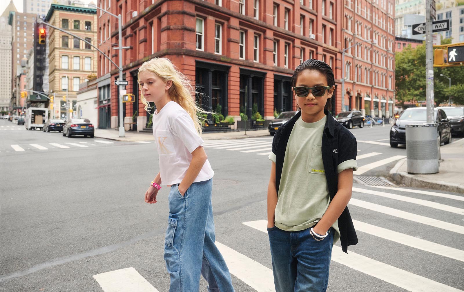 Model posing in casual Calvin Klein outfits in New York city.