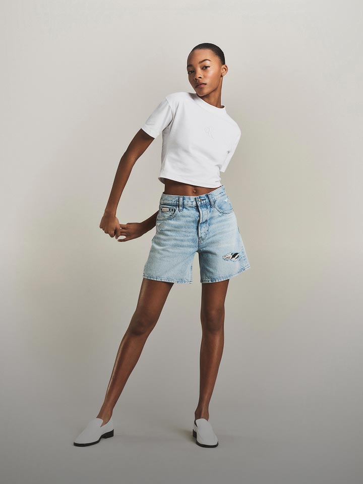 Model posing in a plain white t-shirt