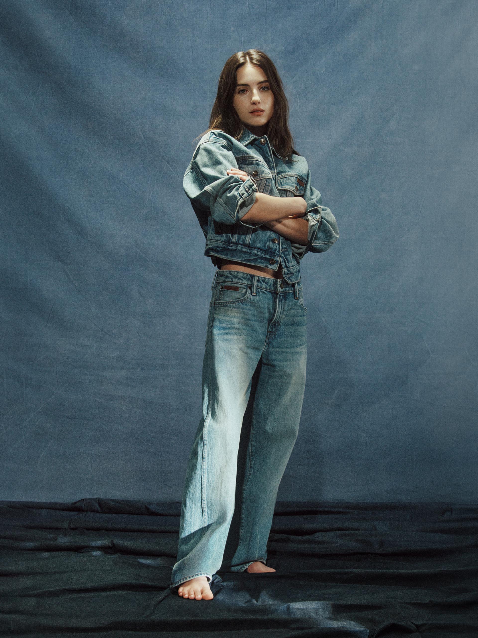 Models posing in Calvin Klein denim.