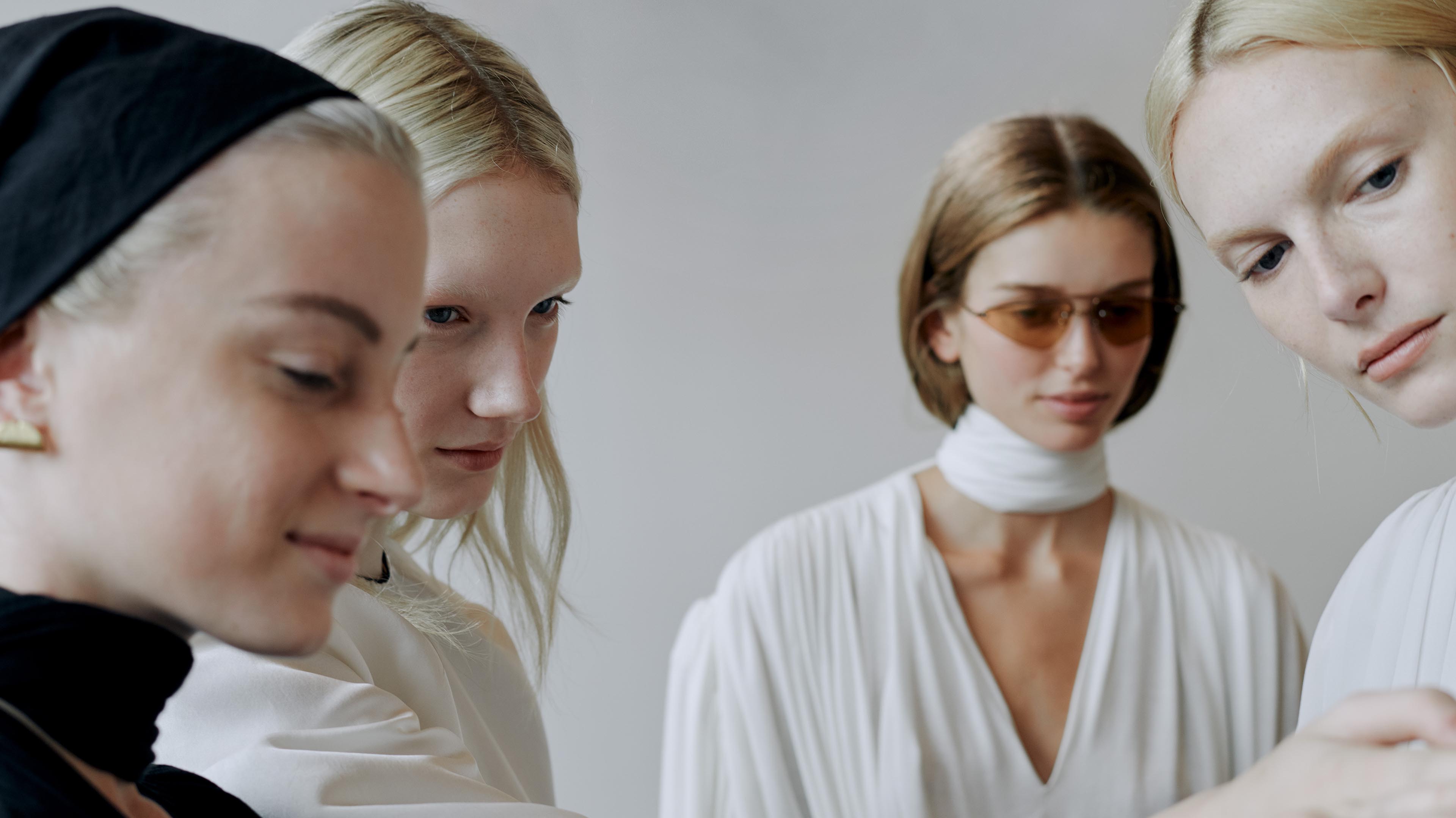 Models posing in Calvin Klein Collection