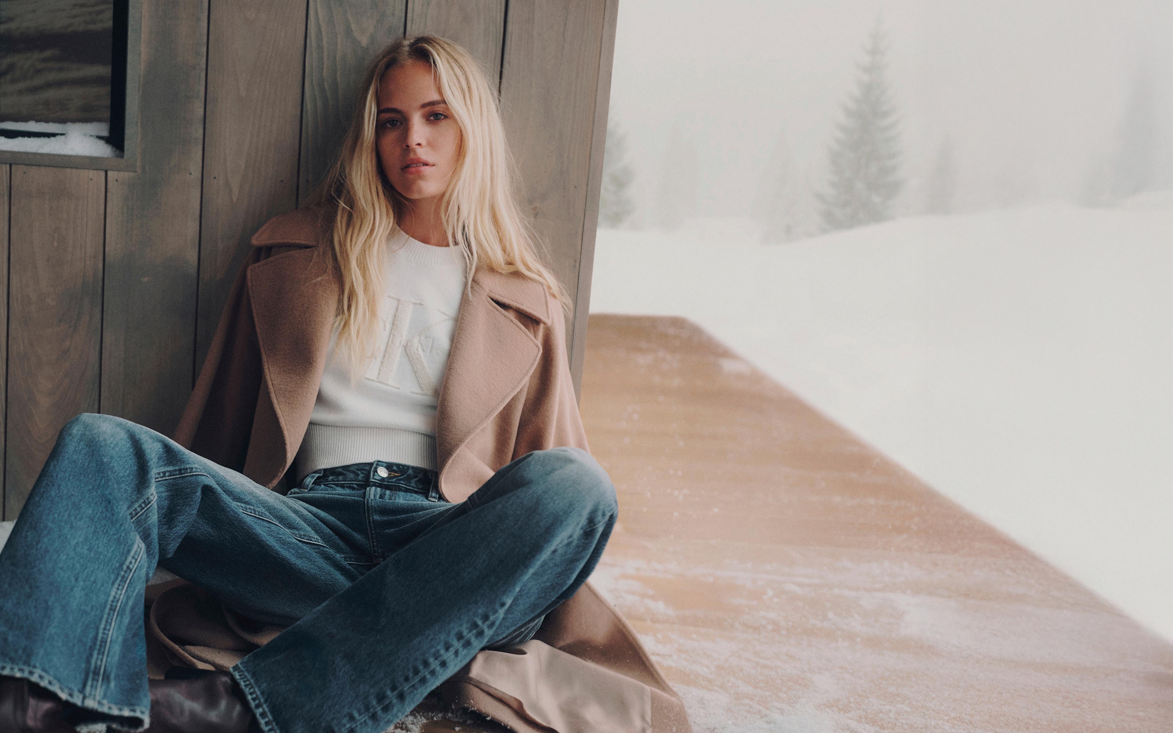 Model posing in Calvin Klein sweater