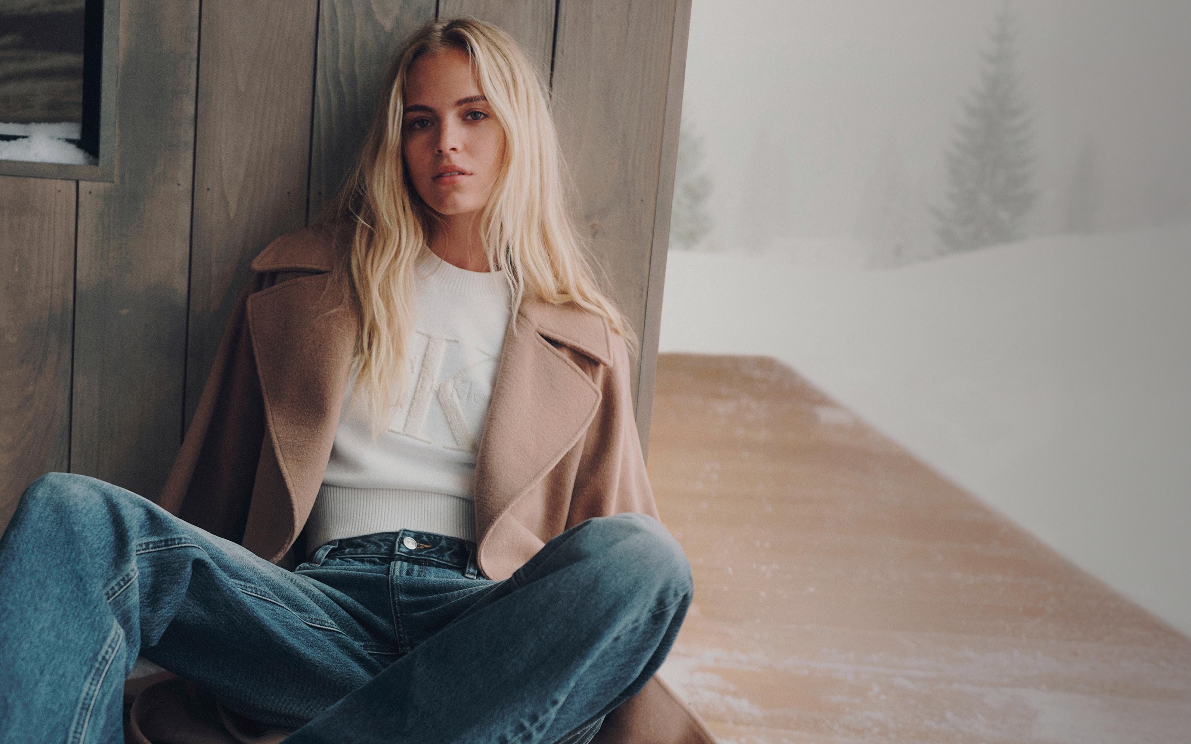 Model posing in Calvin Klein sweater