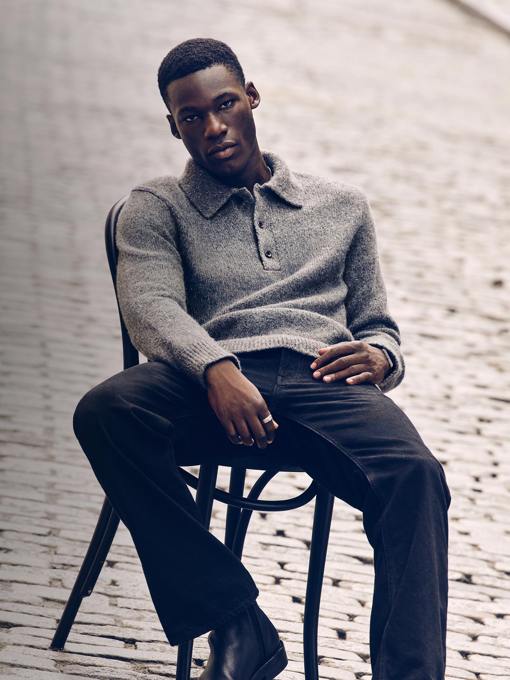 Models posing in Calvin Klein sweaters