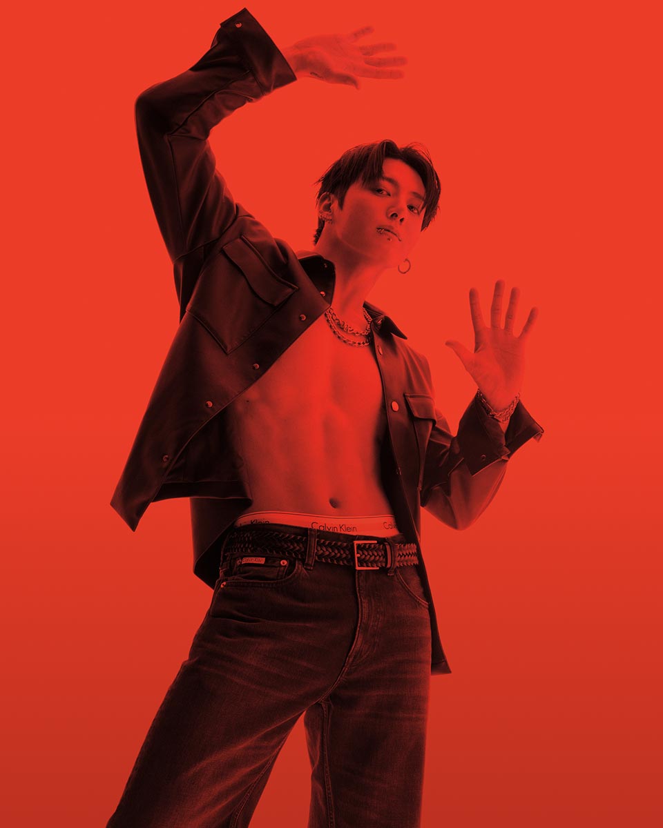 Jung Kook posing in Calvin Klein denim