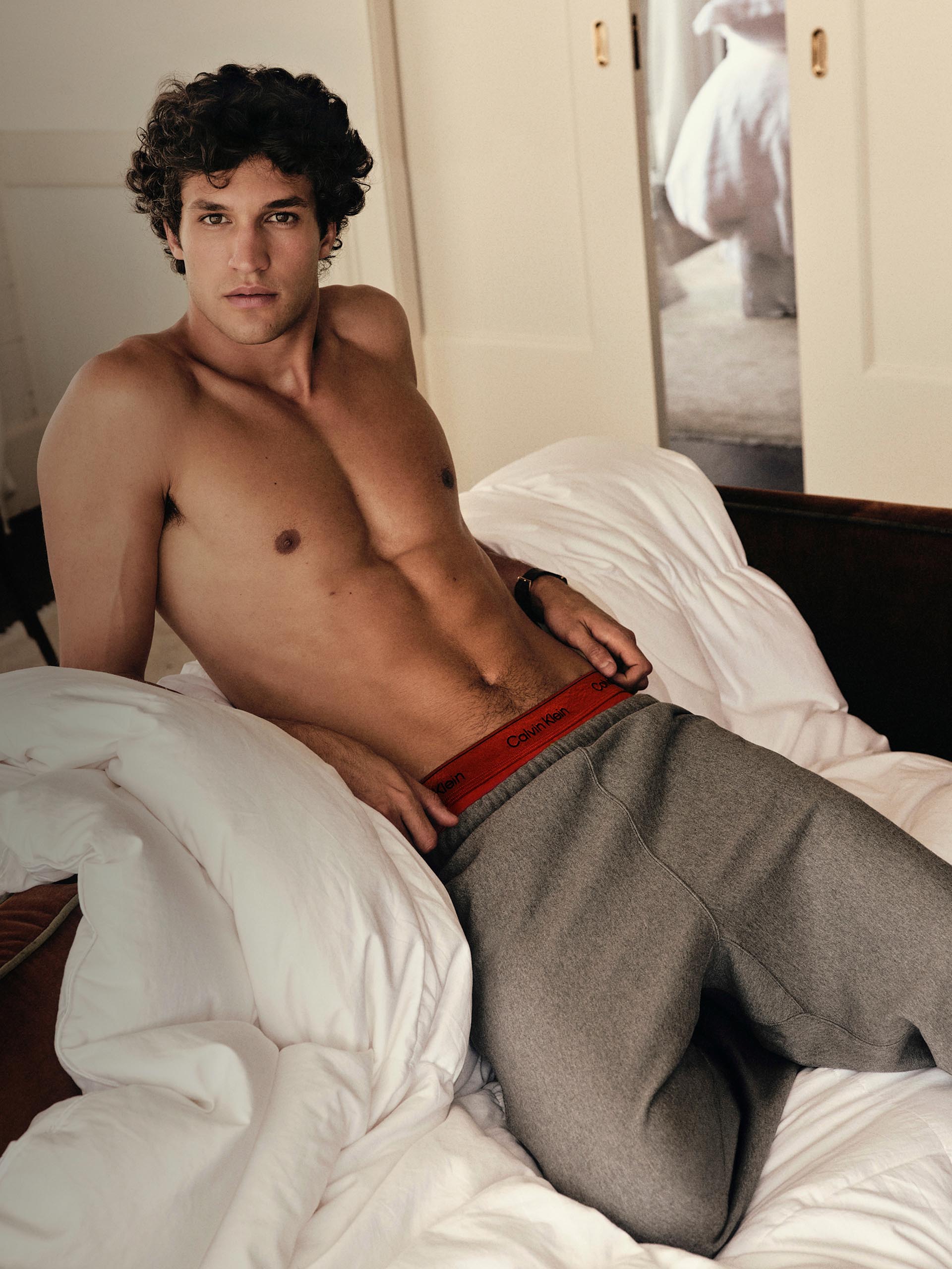 Models posing in Calvin Klein sweats