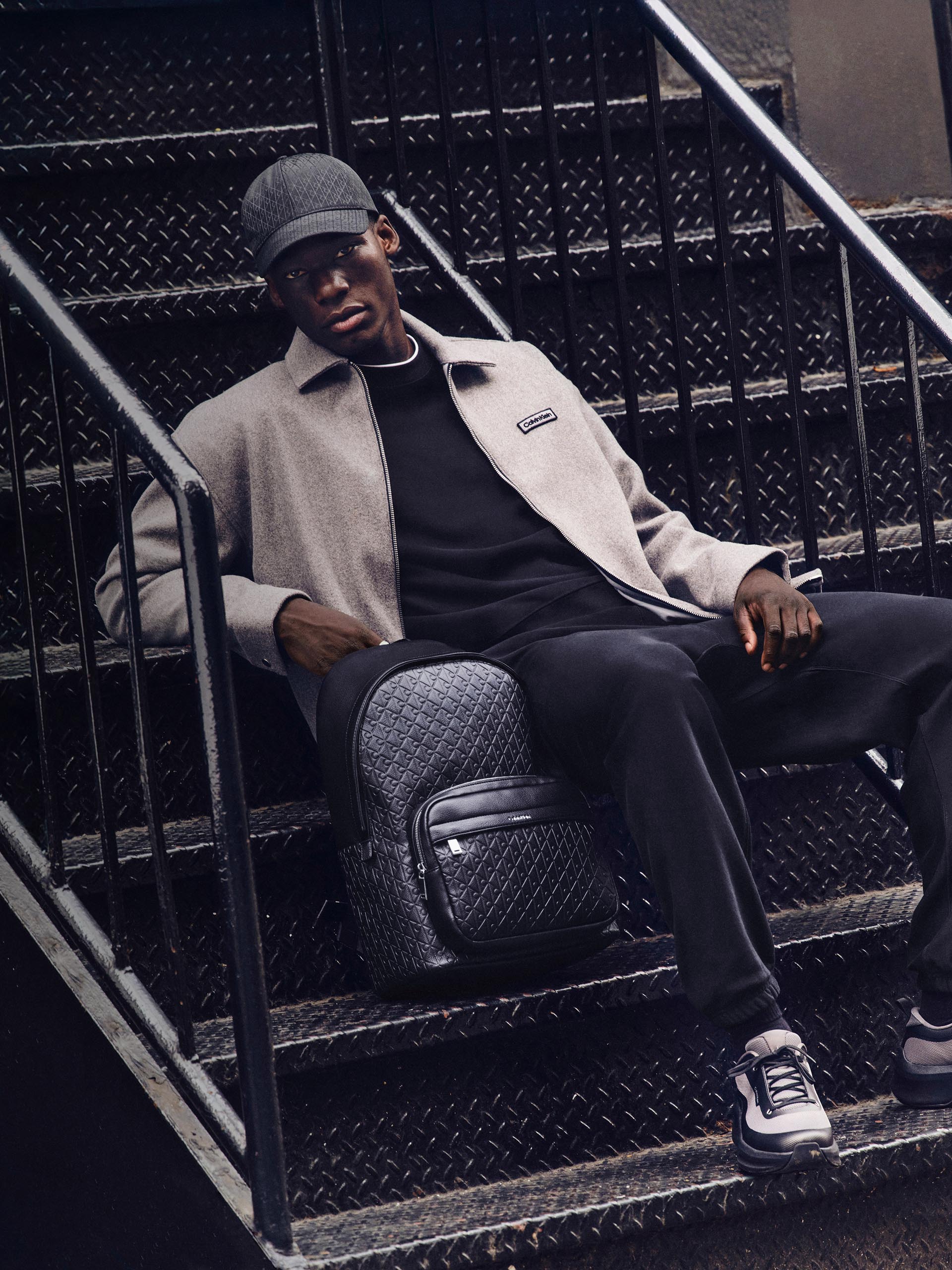 Models posing in Calvin Klein outerwear