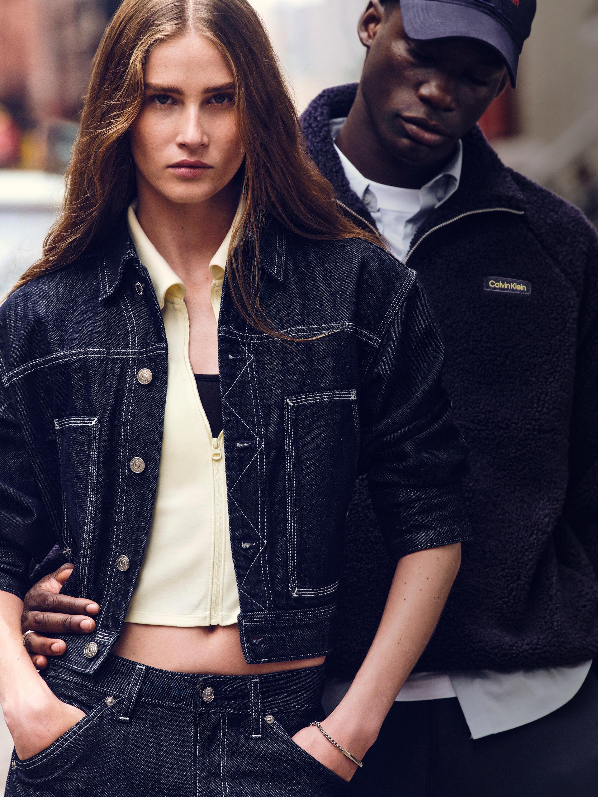 Models posing in Calvin Klein denim