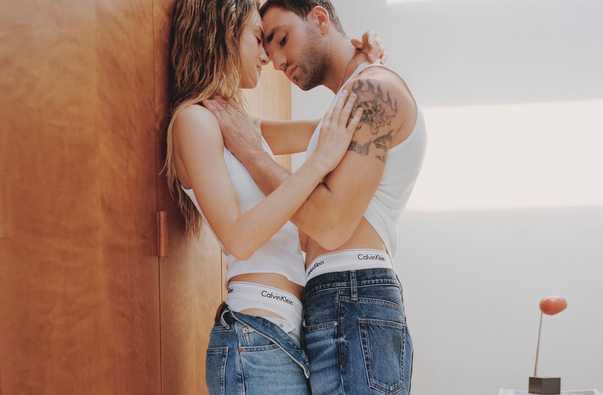 Grace Van Patten posing in Calvin Klein denim