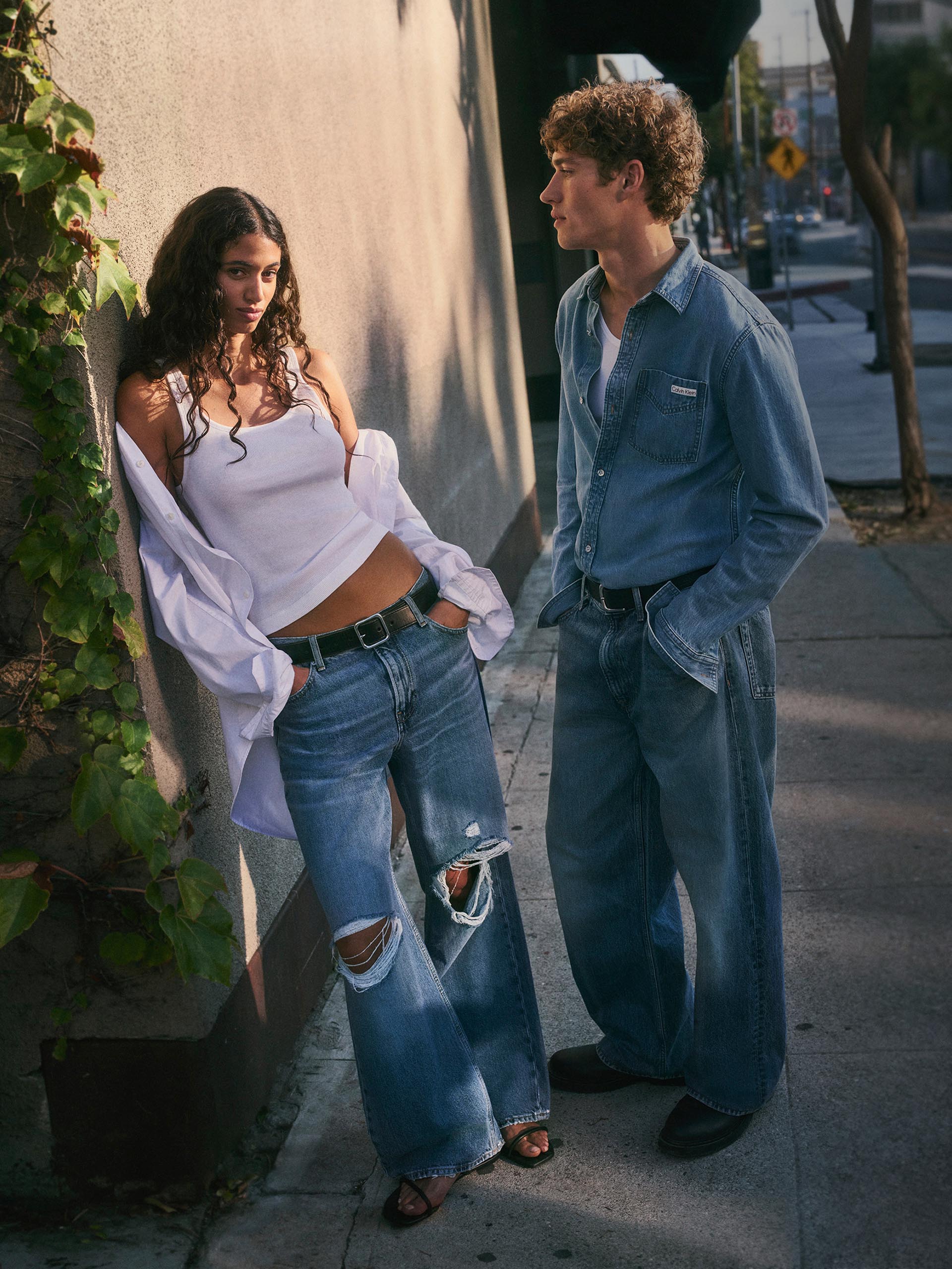 Models posing in Calvin Klein denim
