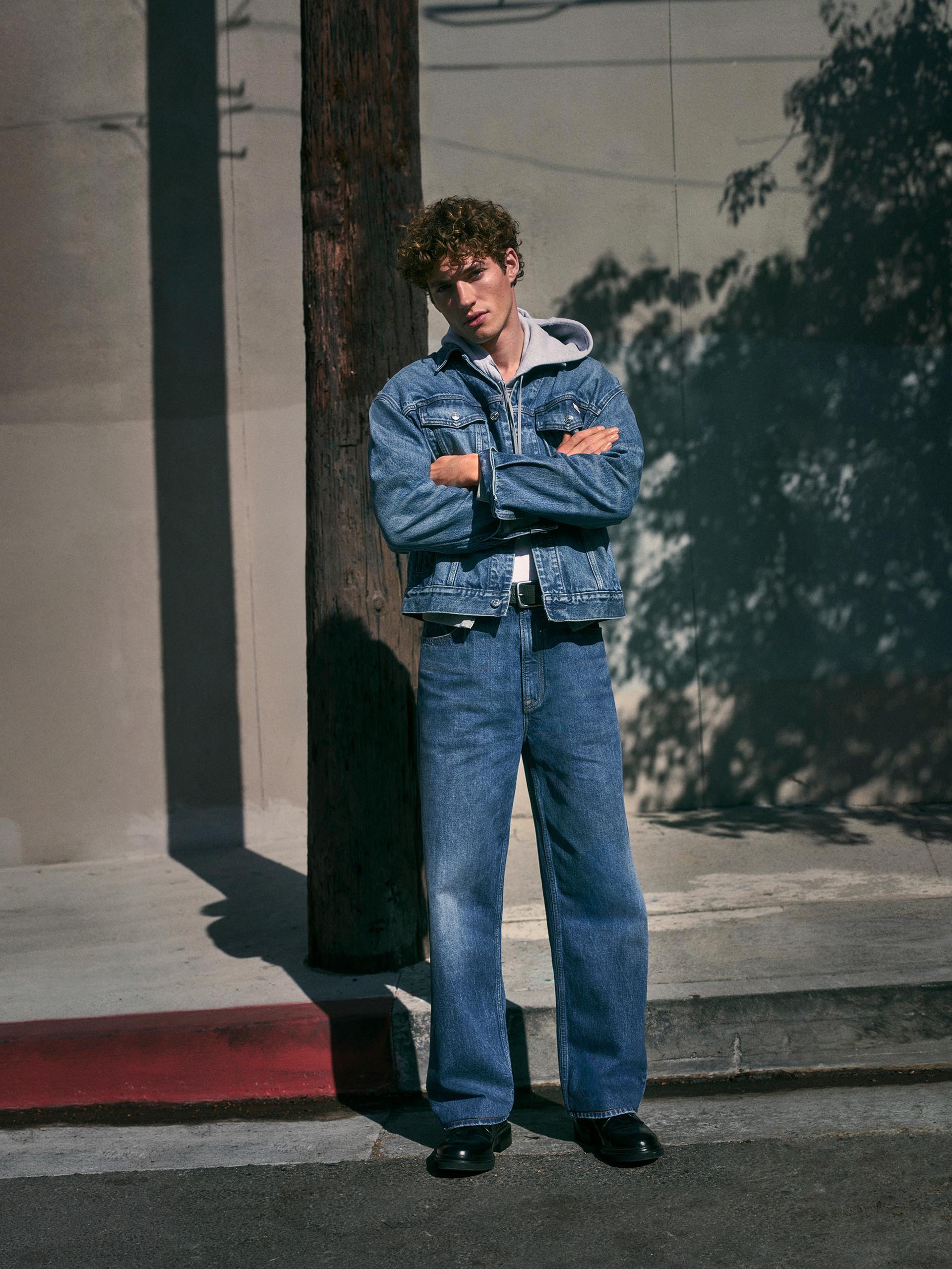 Models posing in transitional Calvin Klein apparel