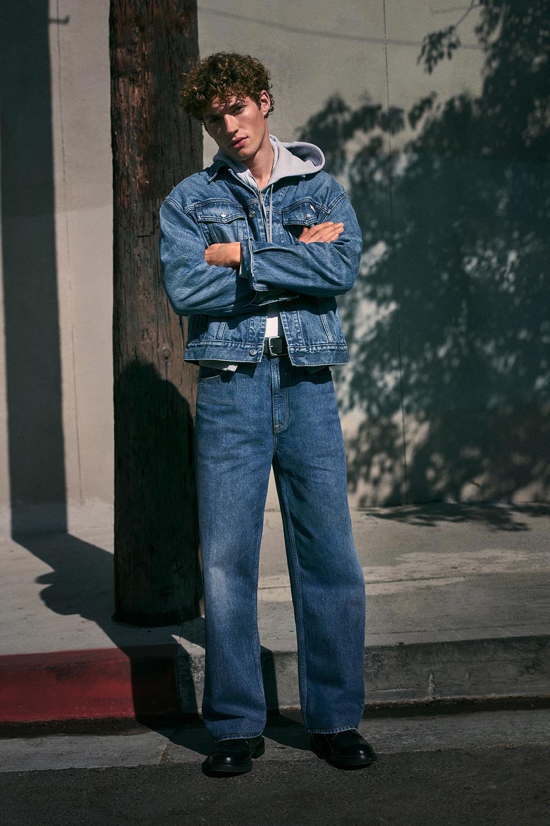 Models posing in transitional Calvin Klein apparel