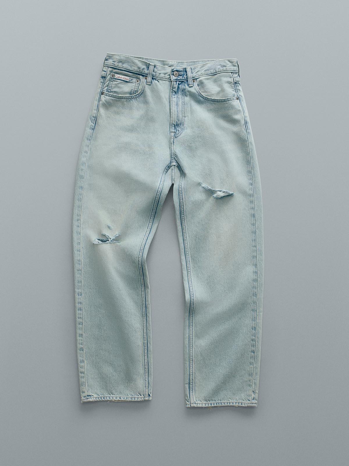 Still life image of light wash denim