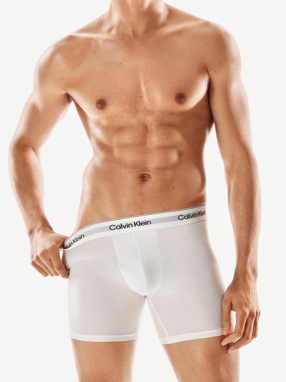 Model posing in Calvin Klein boxer brief underwear