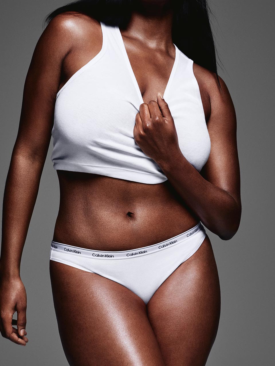 Model posing in Calvin Klein bikini underwear