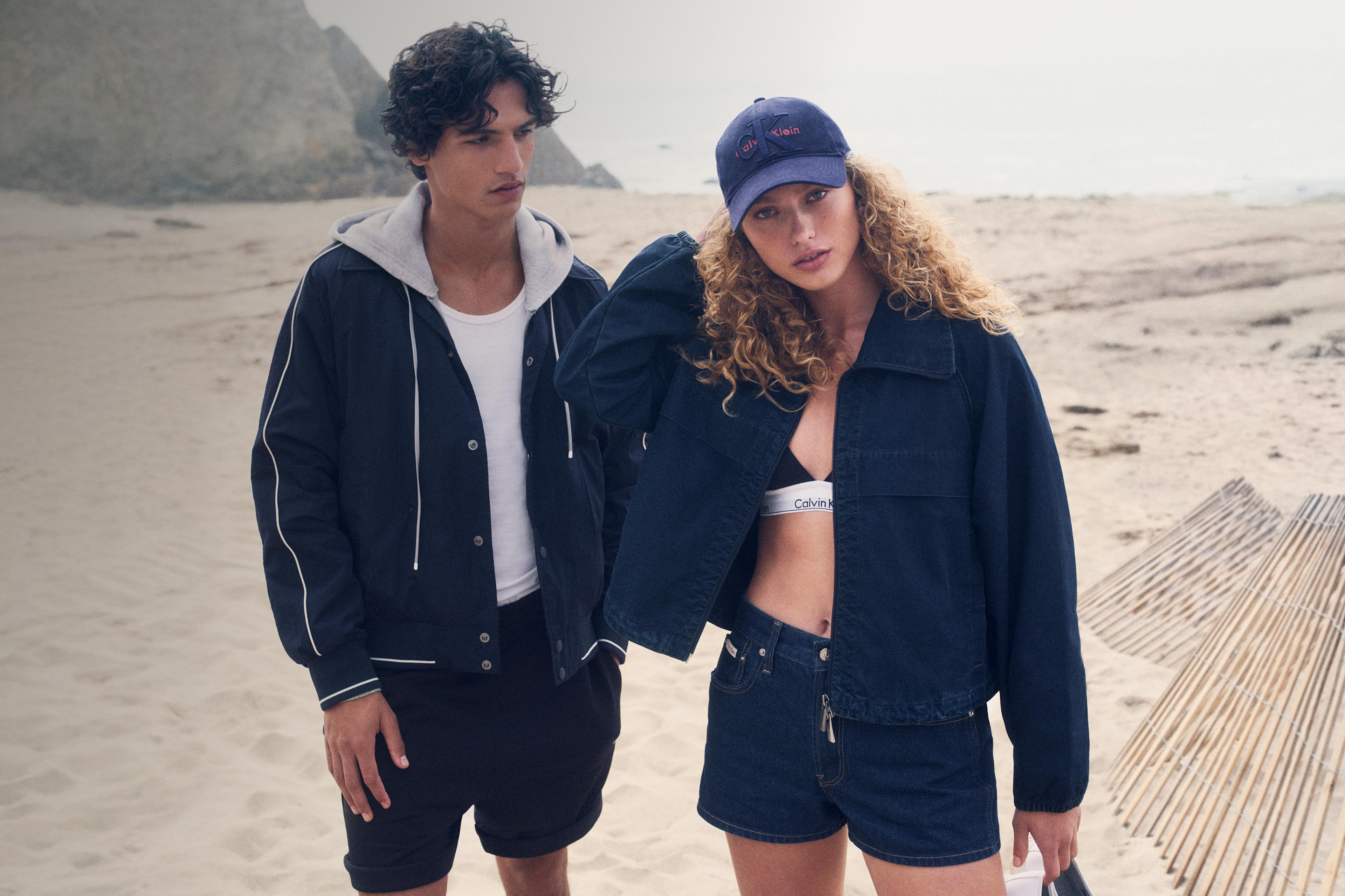 Models posing in Calvin Klein spring jackets