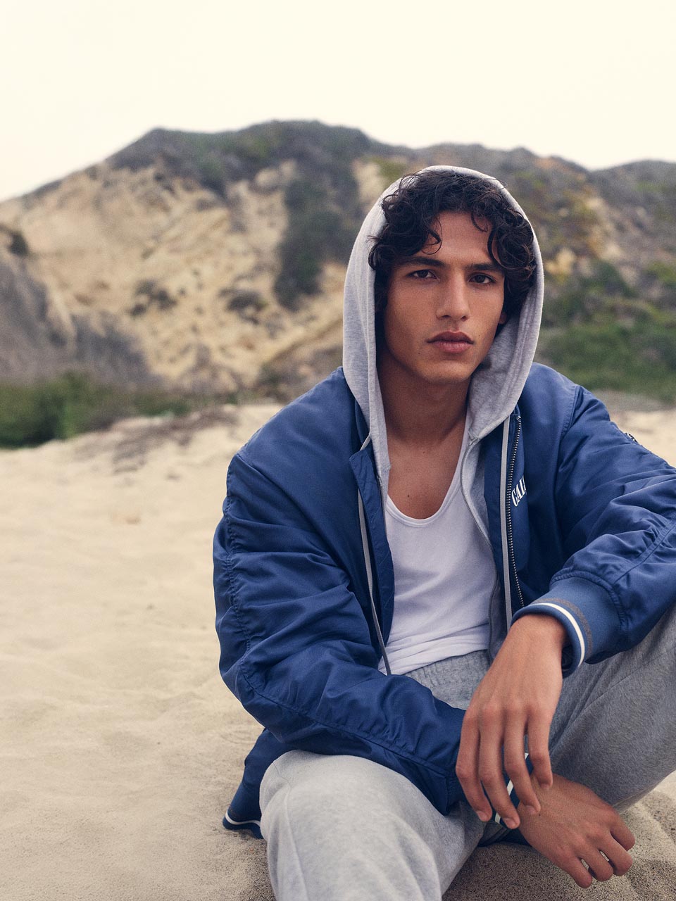 Model posing in a lightweight bomber jacket