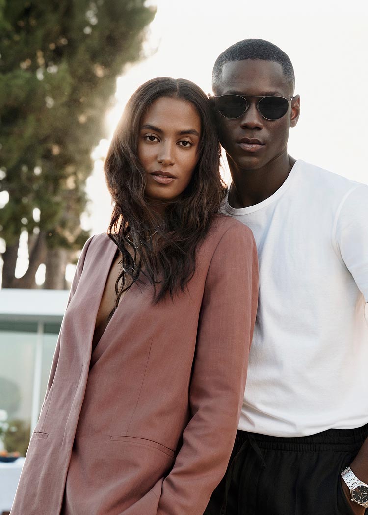 Models posing in Calvin Klein apparel