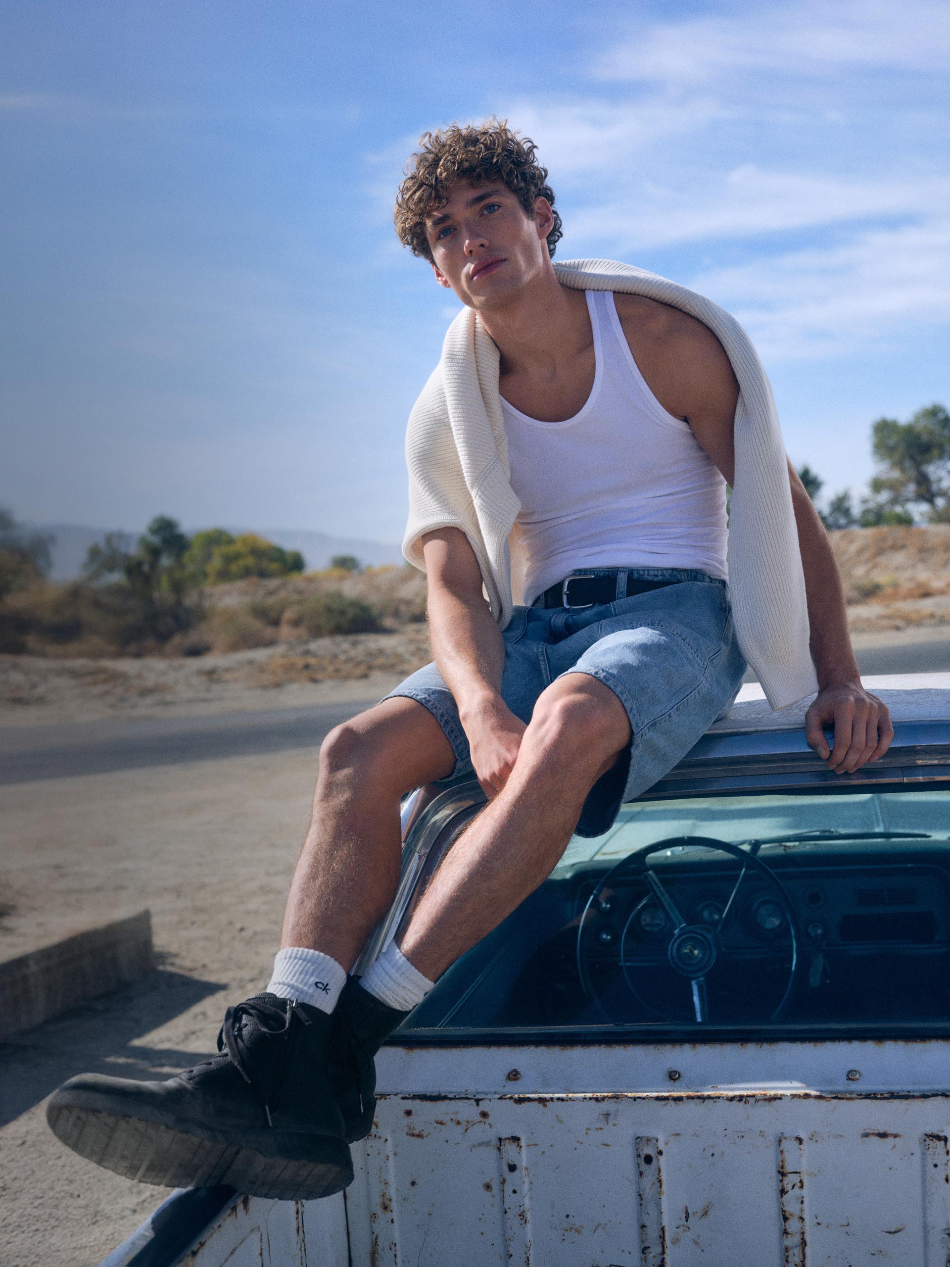 Models posing in Calvin Klein denim