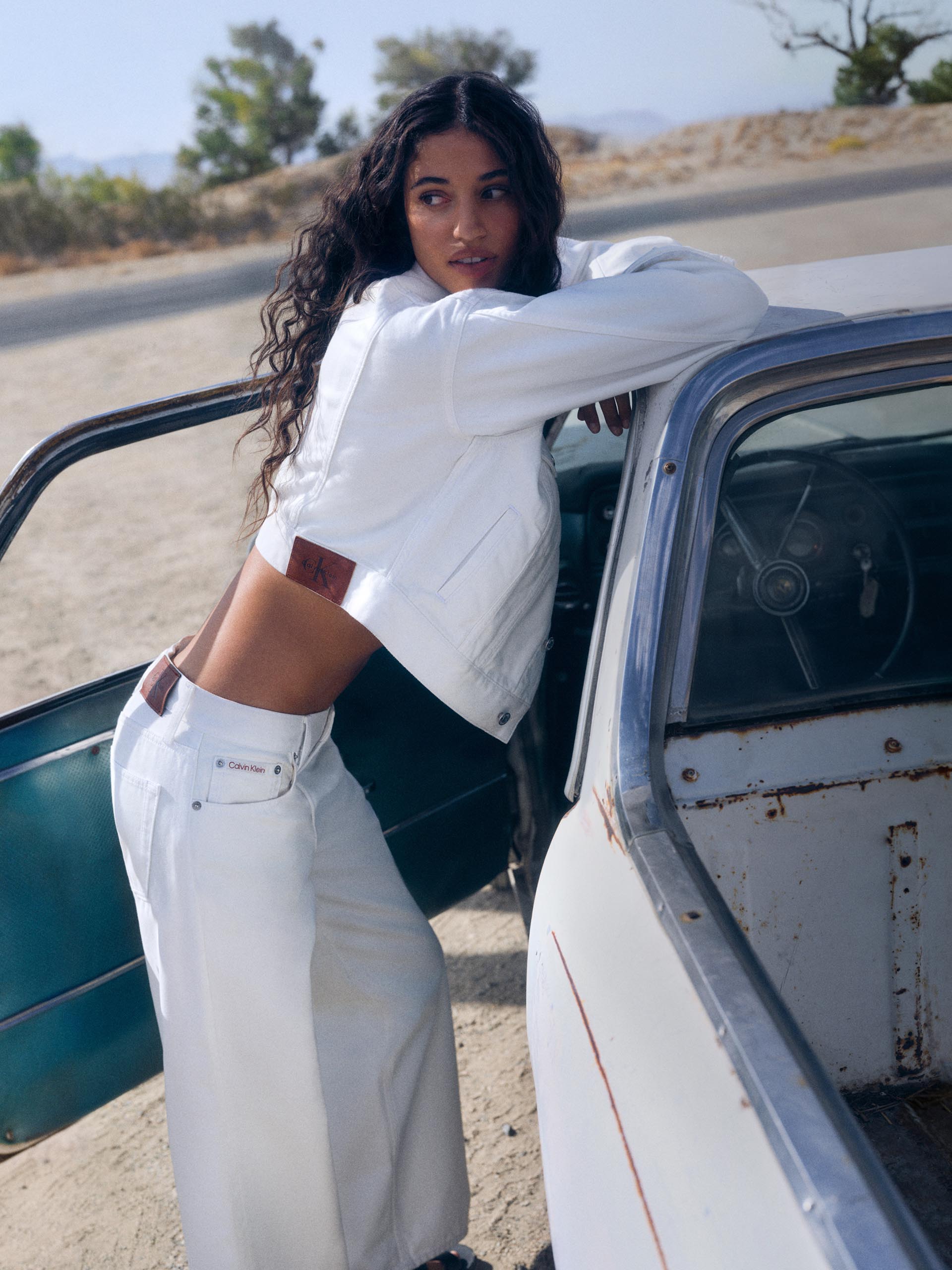Models posing in Calvin Klein denim