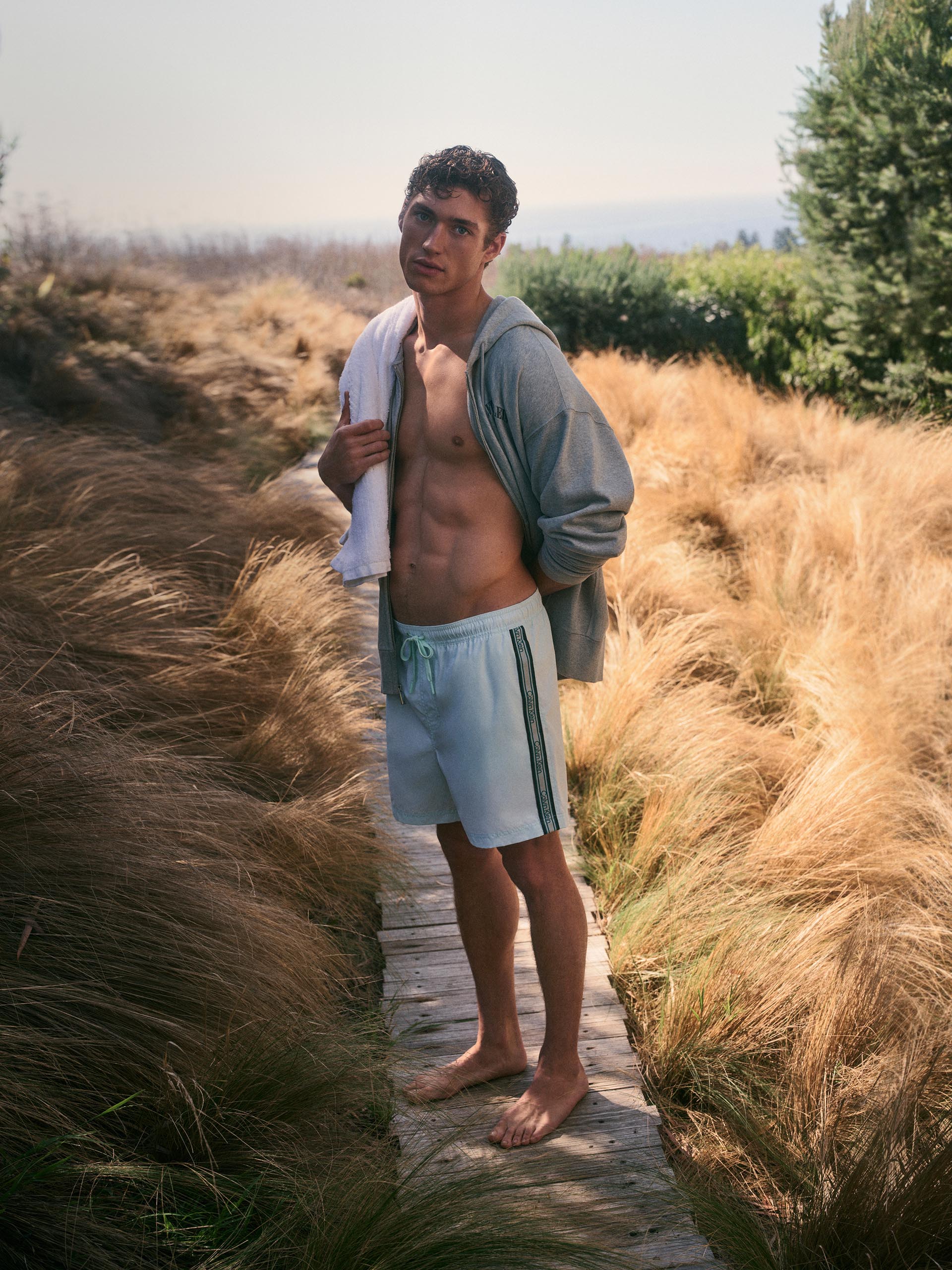 Models posing in Calvin Klein swimwear