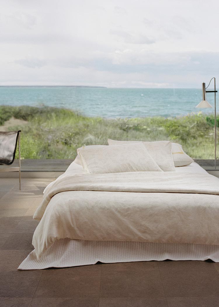 Model posing on a bed