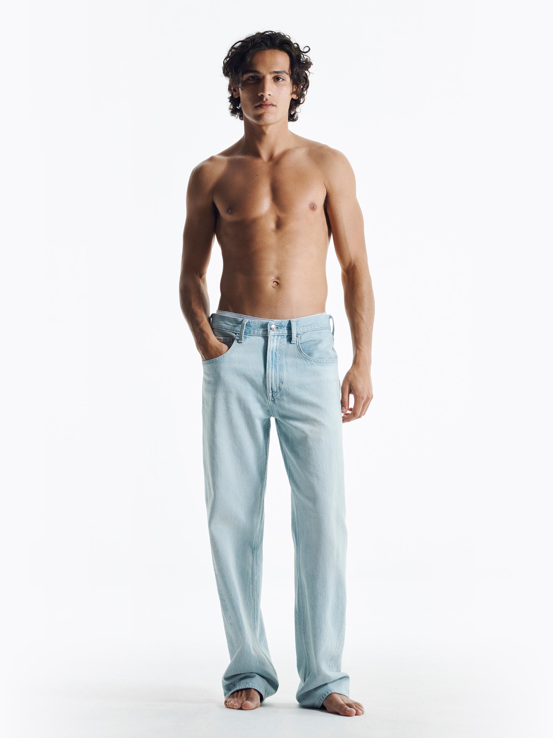 Models posing in Calvin Klein denim