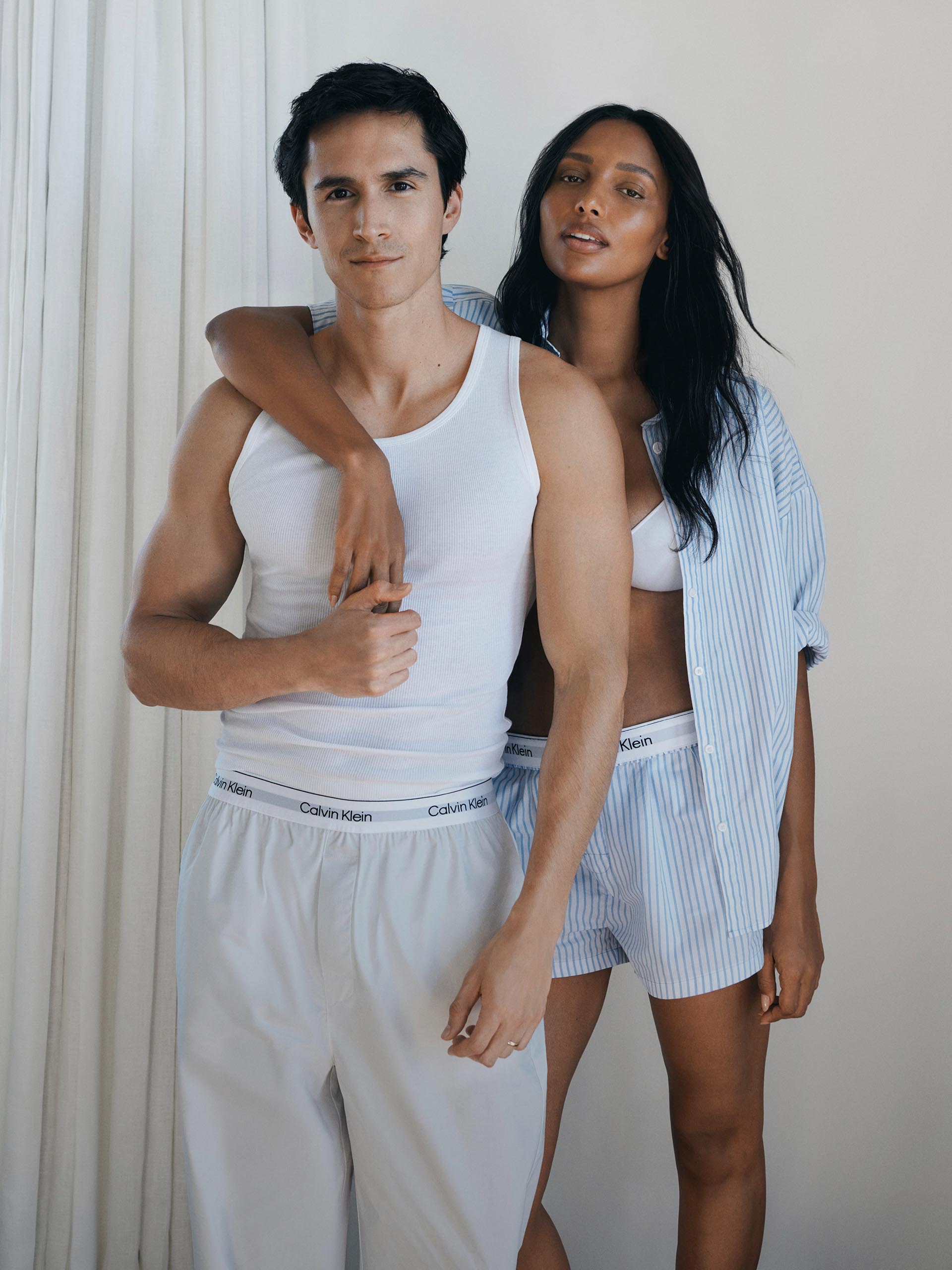 Models posing in new Calvin Klein apparel