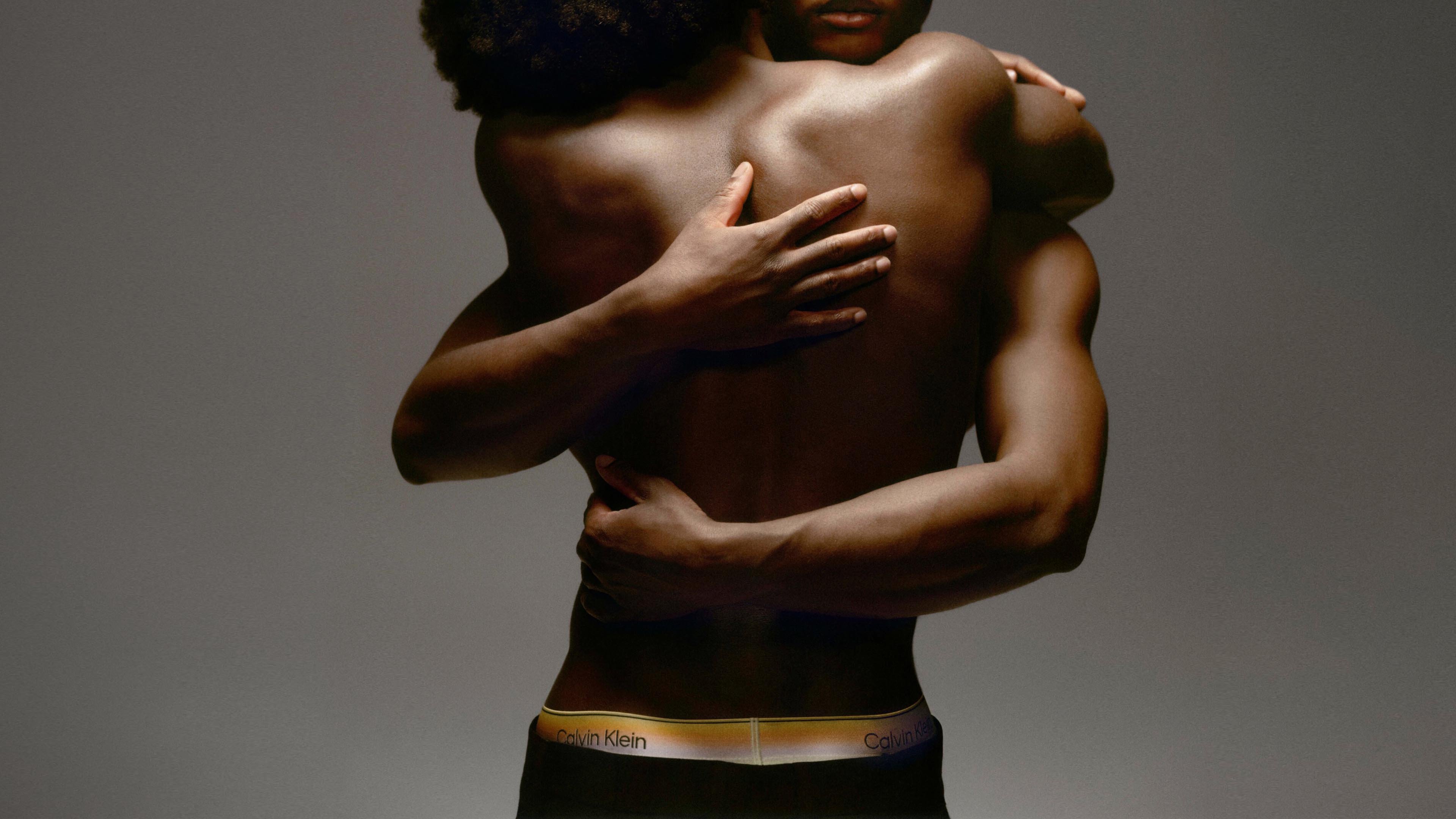 Models posing in Calvin Klein Pride underwear
