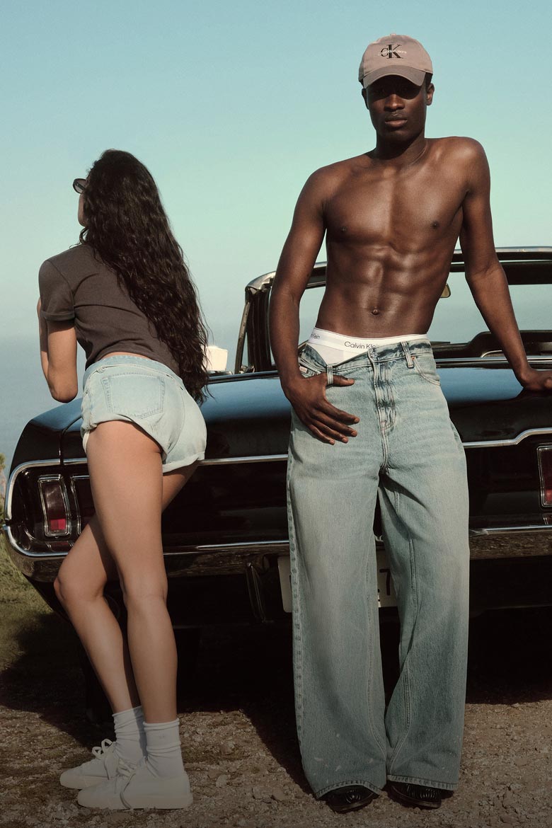 Models posing in Calvin Klein denim
