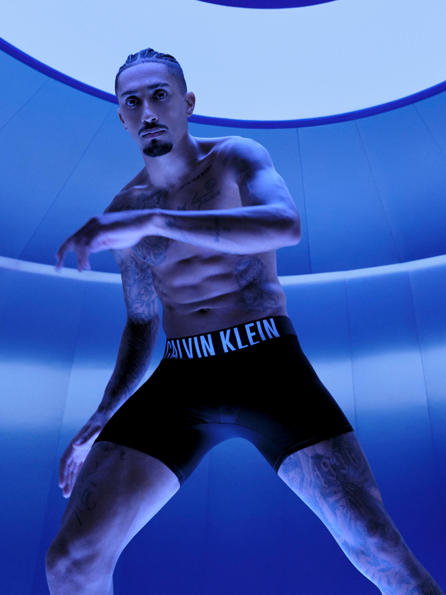 Images of models wearing minimal Calvin Klein apparel and underwear styles