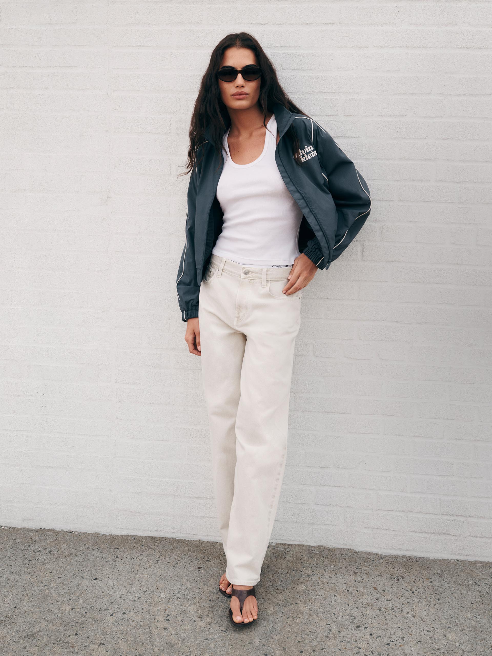 Models posing in lightweight jackets
