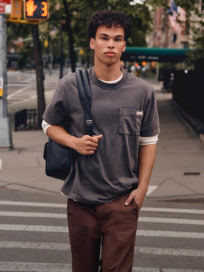 Model posing in apparel perfect for campus days