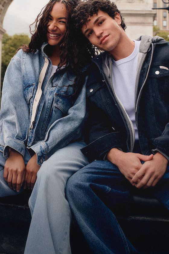 Models posing in lightweight jackets