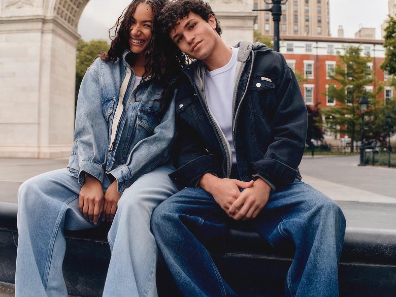 Models posing in Calvin Klein apparel