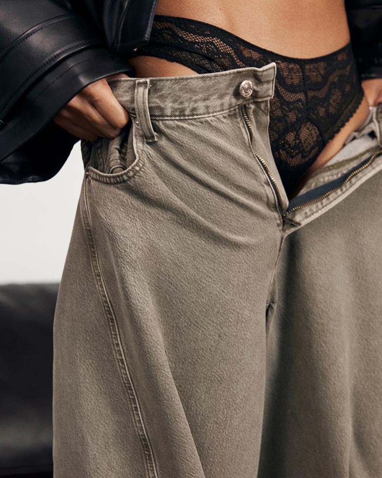 Model posing in the Twisted Low Rise Baggy Jean