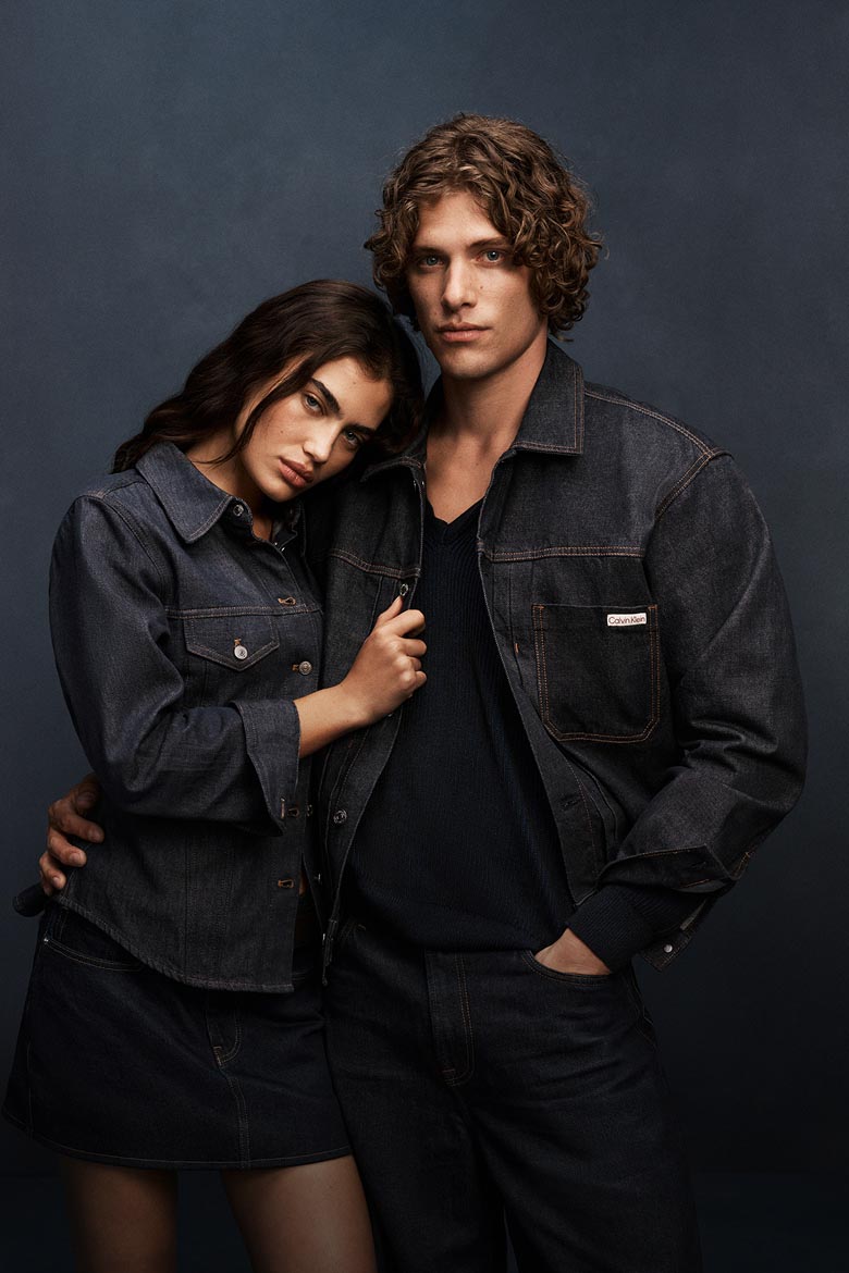 Models posing in denim in dark indigo washes